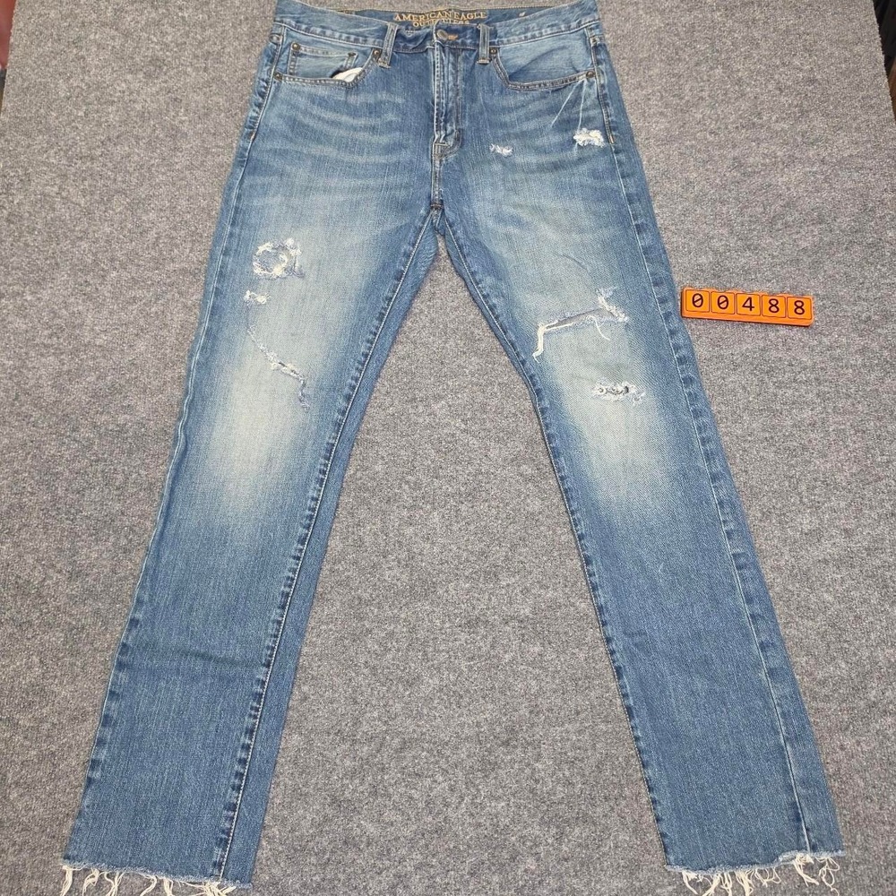 American Eagle Outfitters distressed blue jeans. Size 34/34.